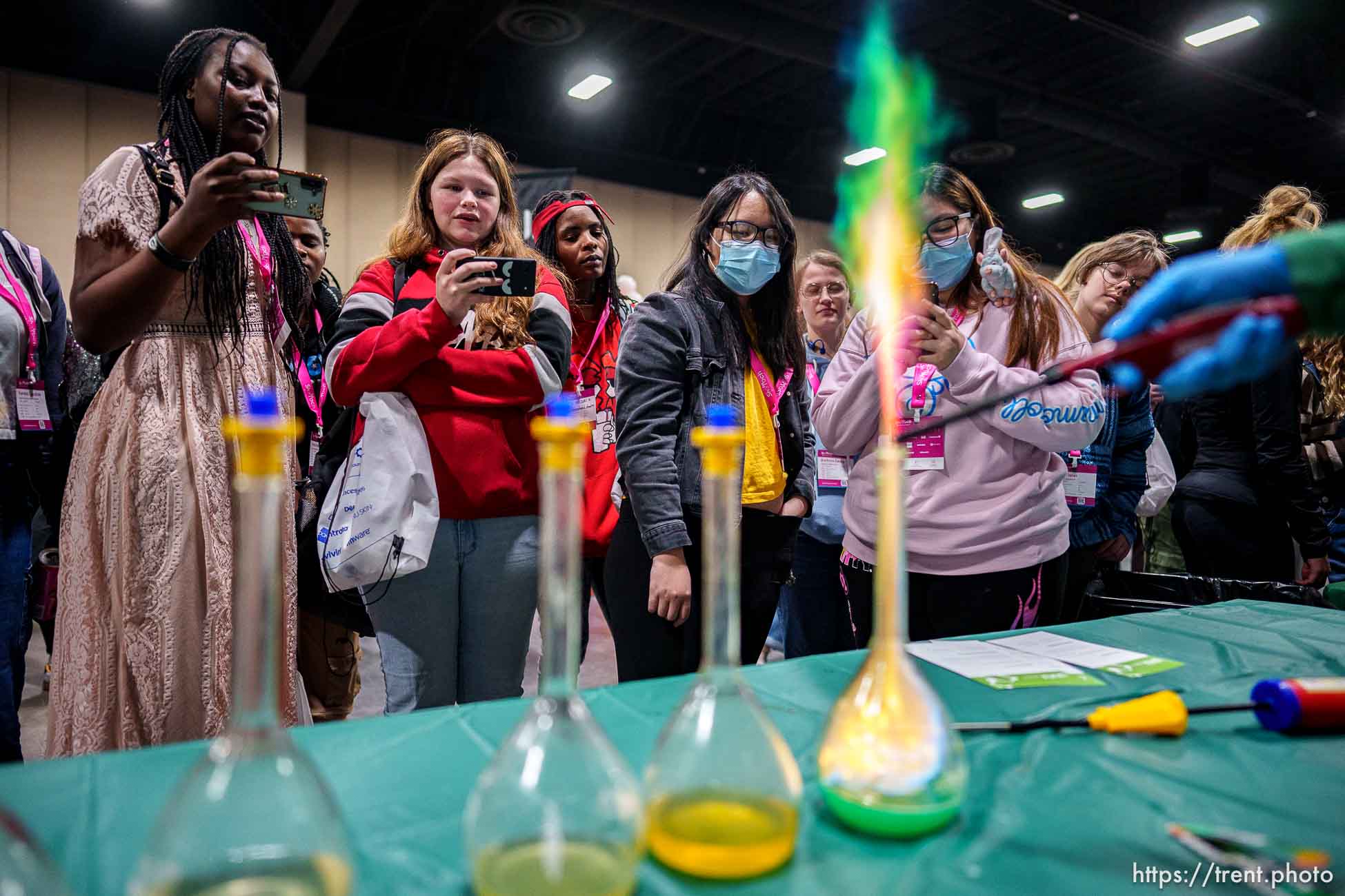 (Trent Nelson  |  The Salt Lake Tribune) Attendees watch experiments by Lakshmi Viswanath, Associate Professor in the Department of Chemistry at Utah Valley University, at SheTech Explorer Day in Sandy on Thursday, March 14, 2024.