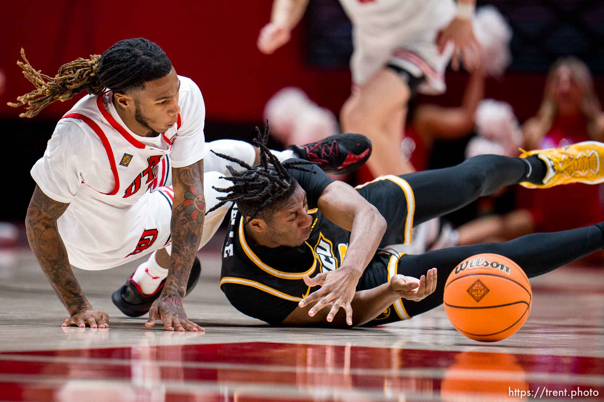 (Trent Nelson  |  The Salt Lake Tribune) Utah Utes guard Deivon Smith (5) and Virginia Commonwealth Rams guard Michael Belle (8) as Utah hosts Virginia Commonwealth in the NIT quarterfinals, NCAA basketball in Salt Lake City on Wednesday, March 27, 2024.