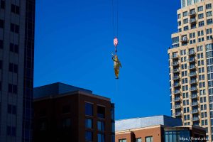 (Trent Nelson  |  The Salt Lake Tribune) The statue of Moroni is returned to the top of the LDS temple in Salt Lake City on Tuesday, April 2, 2024.