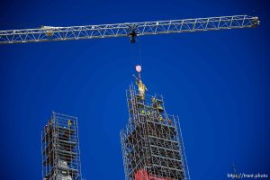 (Trent Nelson  |  The Salt Lake Tribune) The statue of Moroni is returned to the top of the LDS temple in Salt Lake City on Tuesday, April 2, 2024.