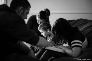 (Trent Nelson  |  The Salt Lake Tribune) Kaden and Megan Mattinson work with their homeschooled children Colten and Aspen in Springville on Thursday, May 9, 2024