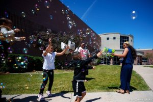 (Trent Nelson  |  The Salt Lake Tribune) Children play with bubbles on the last day of school at Riley Elementary School in Salt Lake City on Thursday, May 30, 2024.