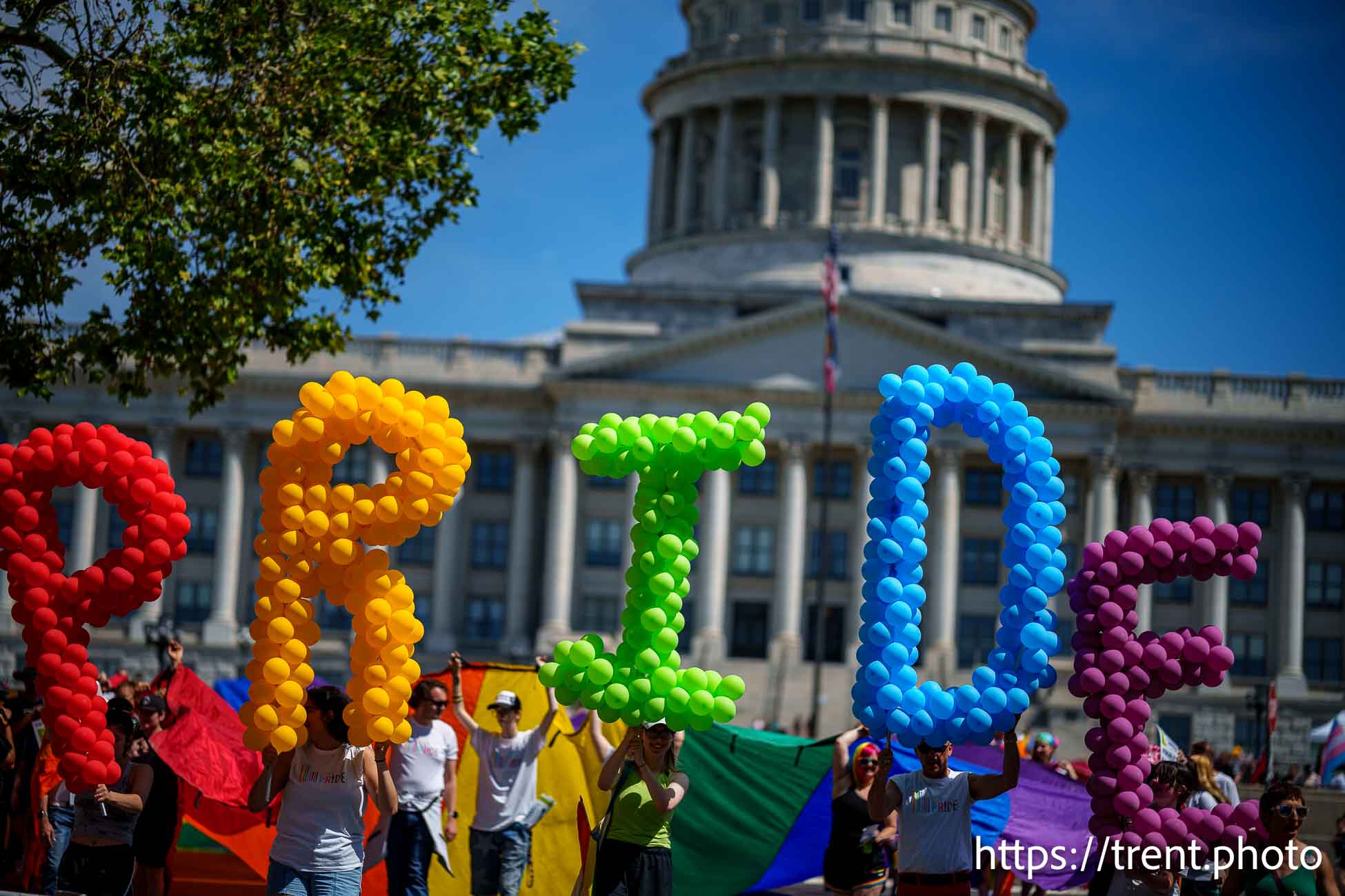 (Trent Nelson  |  The Salt Lake Tribune) People march from the Utah Capitol in Salt Lake City to kick off the Utah Pride Festival on Saturday, June 1, 2024.