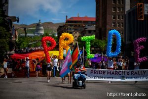 (Trent Nelson  |  The Salt Lake Tribune) People march down State Street in Salt Lake City to kick off the Utah Pride Festival on Saturday, June 1, 2024.