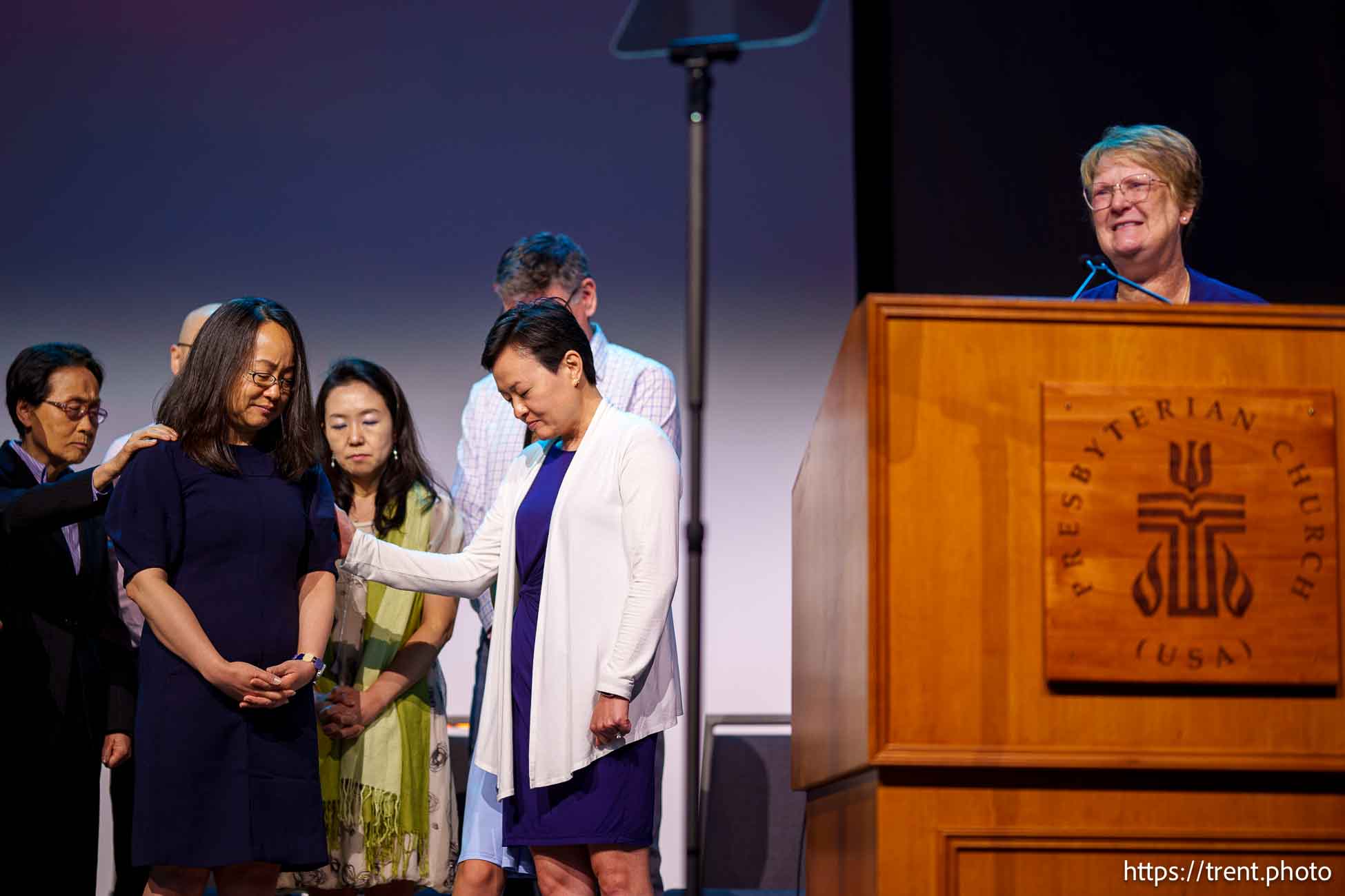 (Trent Nelson  |  The Salt Lake Tribune) Rev. Bronwen Boswell speaks as newly elected Stated Clerk Rev. Jihyun Oh is surrounded by family members, at the Presbyterian Church General Assembly in Salt Lake City on Monday, July 1, 2024.