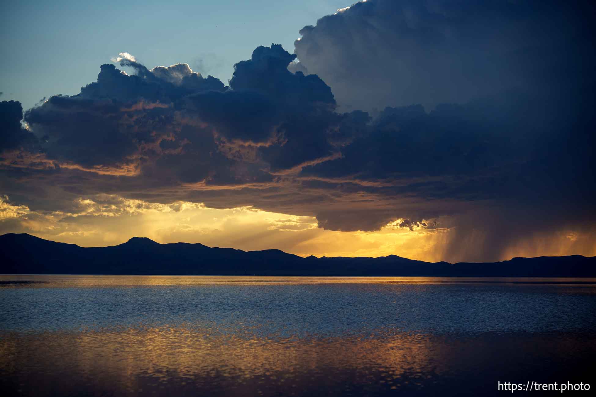 sunset and thunderstorm, great salt lake, on Monday, Aug. 19, 2024.