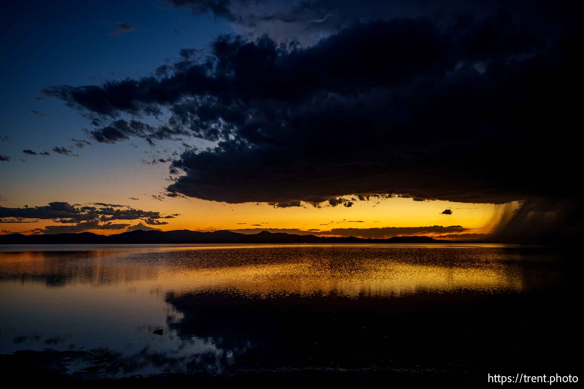 sunset and thunderstorm, great salt lake, on Monday, Aug. 19, 2024.