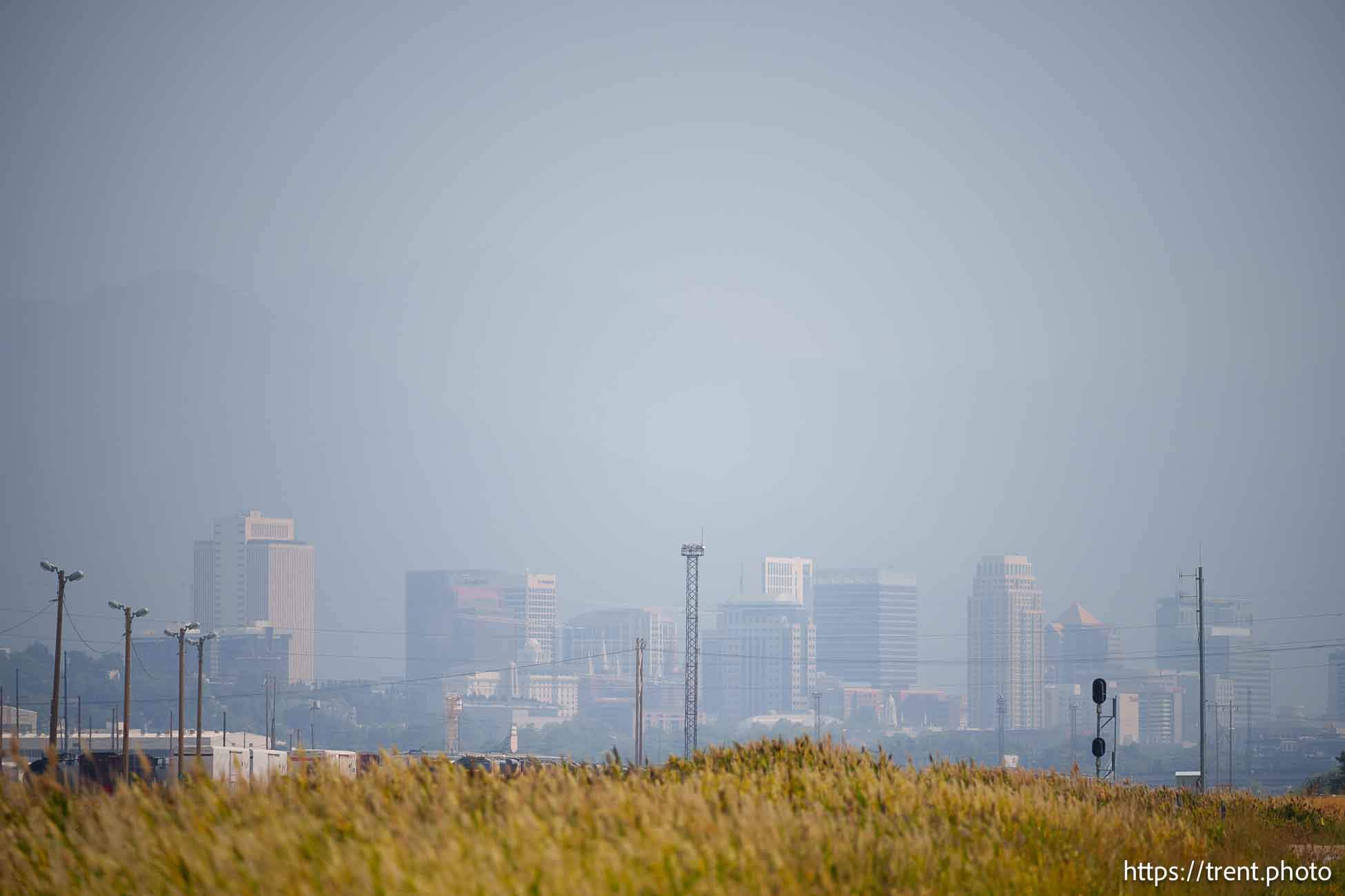 (Trent Nelson  |  The Salt Lake Tribune) Dust and smoke fills the air over Salt Lake City on Saturday, Aug. 24, 2024.