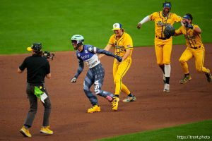 (Trent Nelson  |  The Salt Lake Tribune) Savannah Bananas right fielder Reese Alexiades rounds the bases in ski boots after his home run against the Party Animals as part of the Banana Ball World Tour at Smith's Ballpark in Salt Lake City on Friday, Aug. 30, 2024.