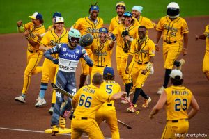 (Trent Nelson  |  The Salt Lake Tribune) Savannah Bananas right fielder Reese Alexiades rounds the bases in ski boots after his home run against the Party Animals as part of the Banana Ball World Tour at Smith's Ballpark in Salt Lake City on Friday, Aug. 30, 2024.