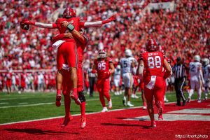 (Trent Nelson  |  The Salt Lake Tribune) Utah Utes quarterback Cameron Rising (7) and Utah Utes running back Micah Bernard (2) celebrate a touchdown as the Utah Utes host the Baylor Bears, NCAA football in Salt Lake City on Saturday, Sept. 7, 2024.