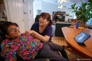 (Trent Nelson  |  The Salt Lake Tribune) Heidi Hilton sings a Taylor Swift song for her daughter Chetna in their Orem home on Wednesday, Sept. 18, 2024.