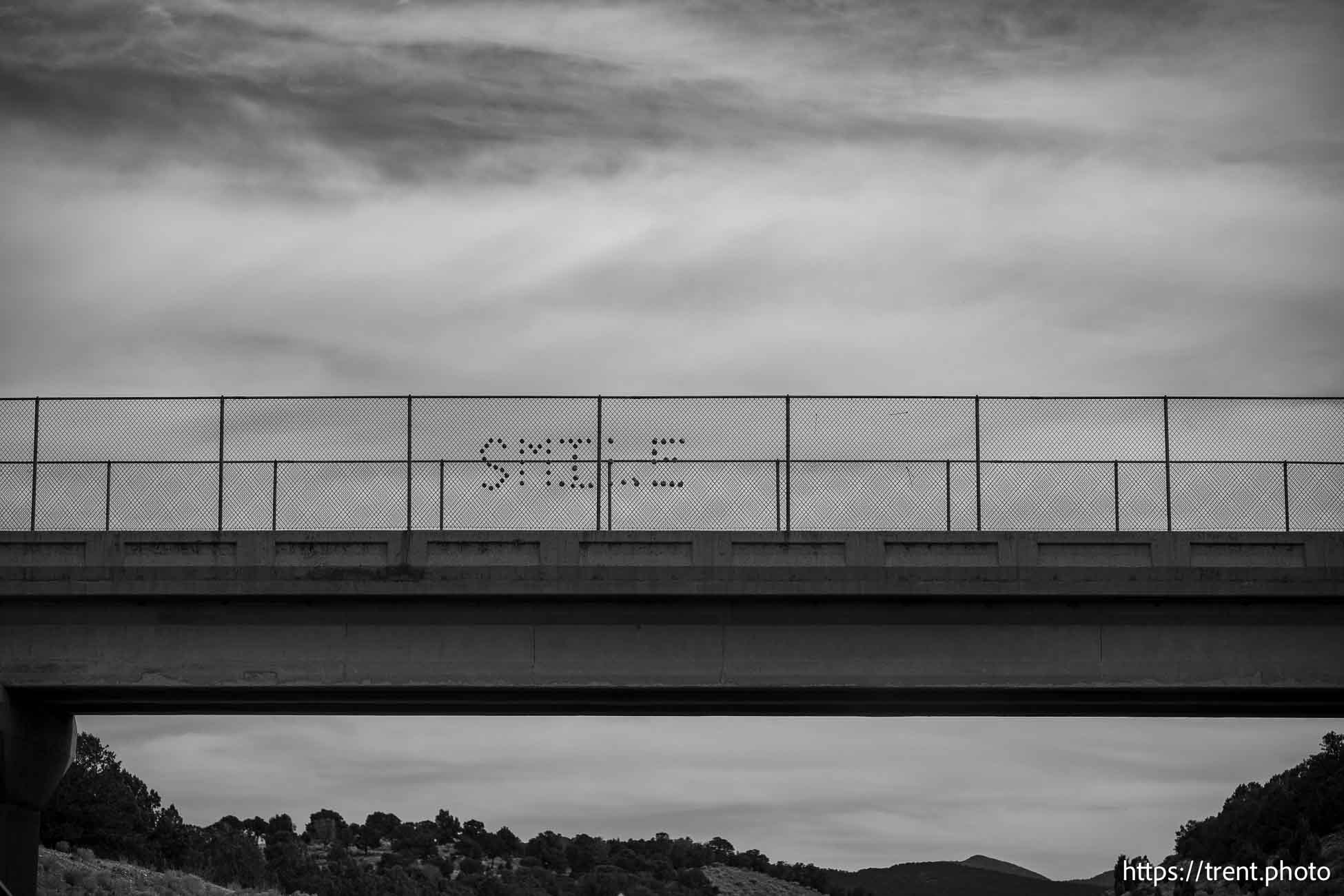 smile, overpass, driving south to short creek on Thursday, Oct. 10, 2024.