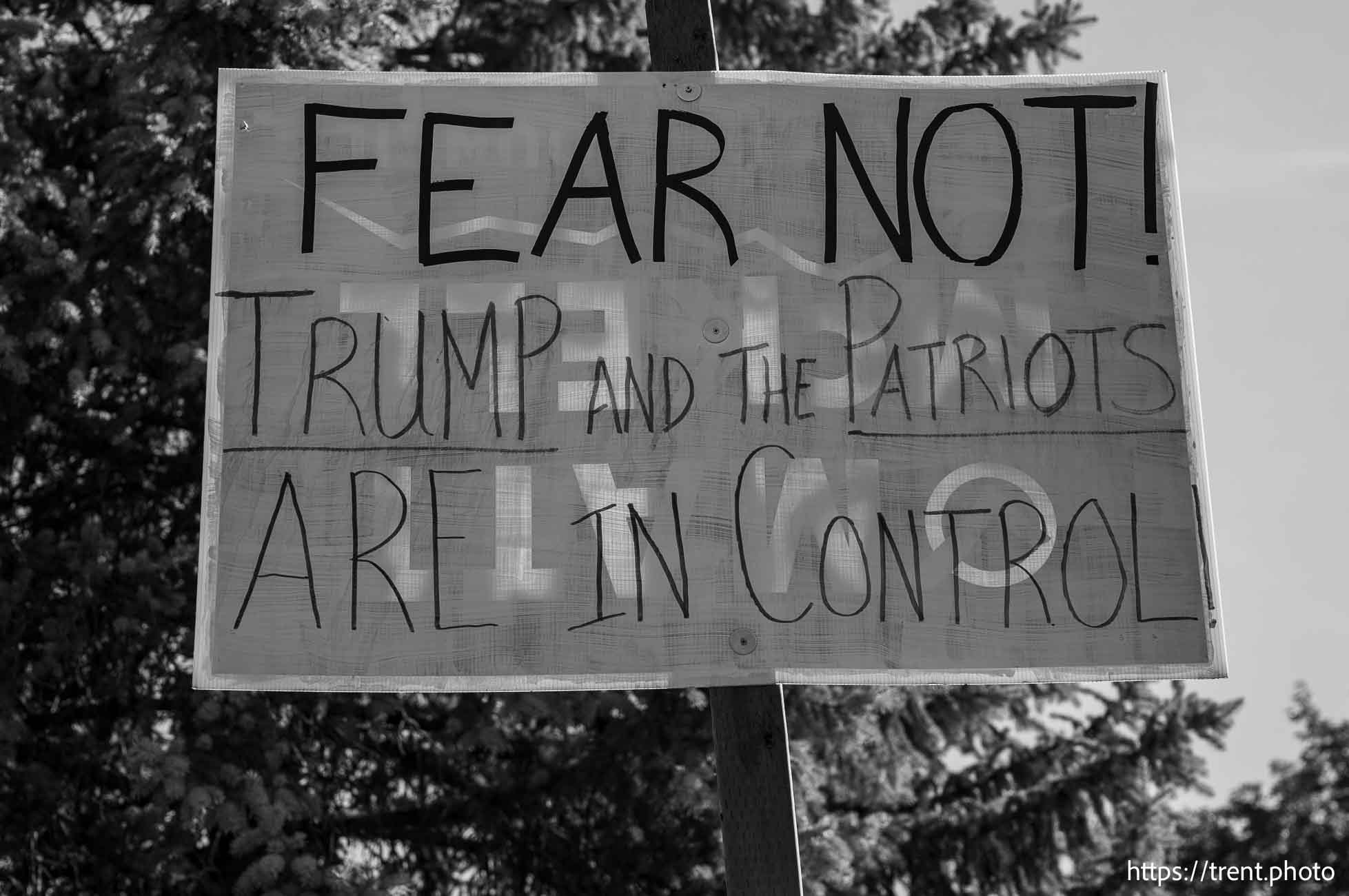 Donald Trump signs in Orem on Monday, Sept. 30, 2024.