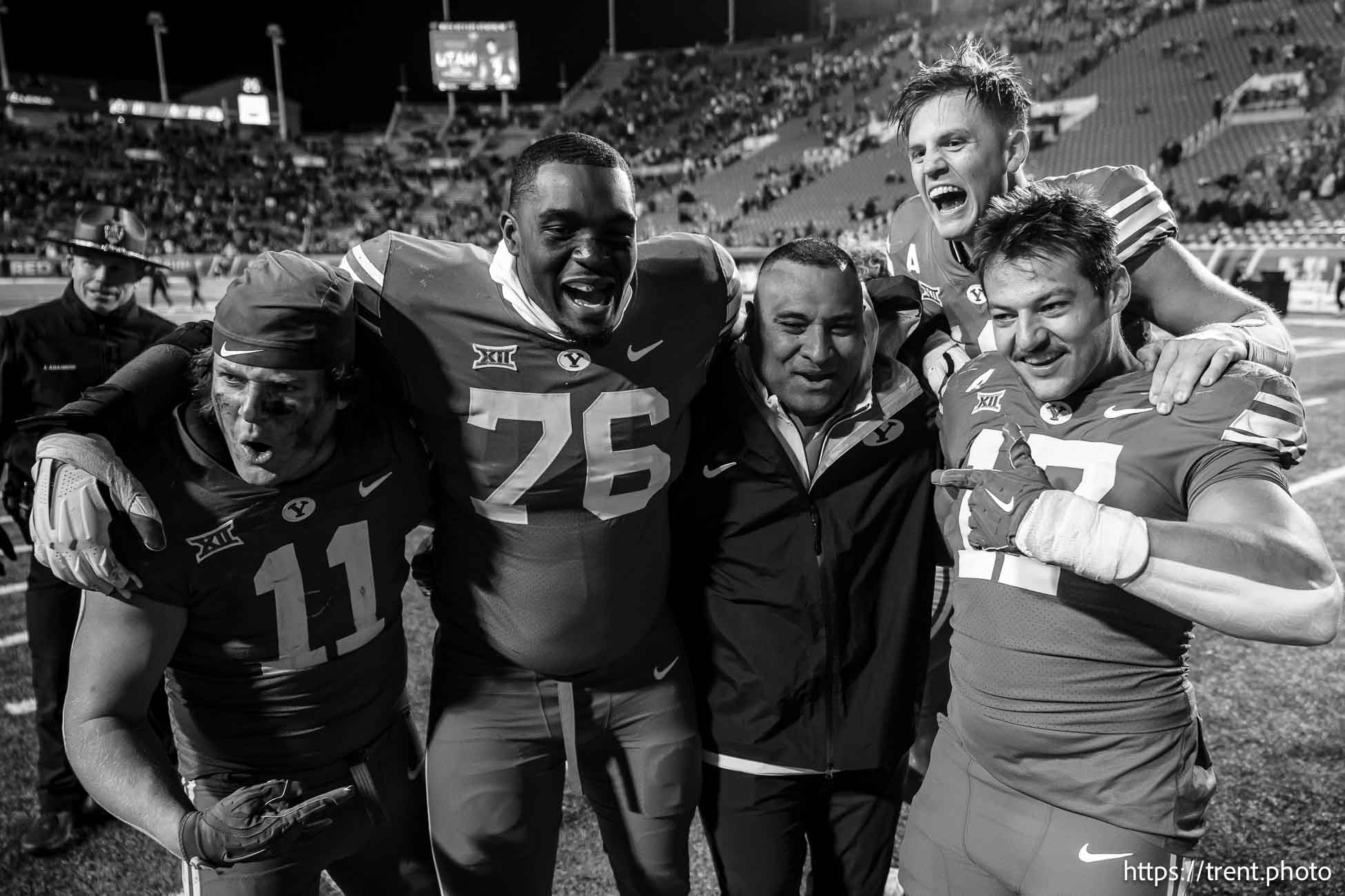 (Trent Nelson  |  The Salt Lake Tribune) Kalani Sitake celebrates with players as Utah hosts BYU, NCAA football in Salt Lake City on Sunday, Nov. 10, 2024.