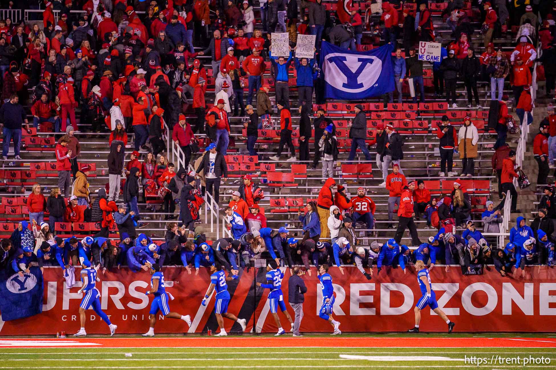 (Trent Nelson  |  The Salt Lake Tribune) 
BYU players celebrate with fans as Utah hosts BYU, NCAA football in Salt Lake City on Sunday, Nov. 10, 2024.