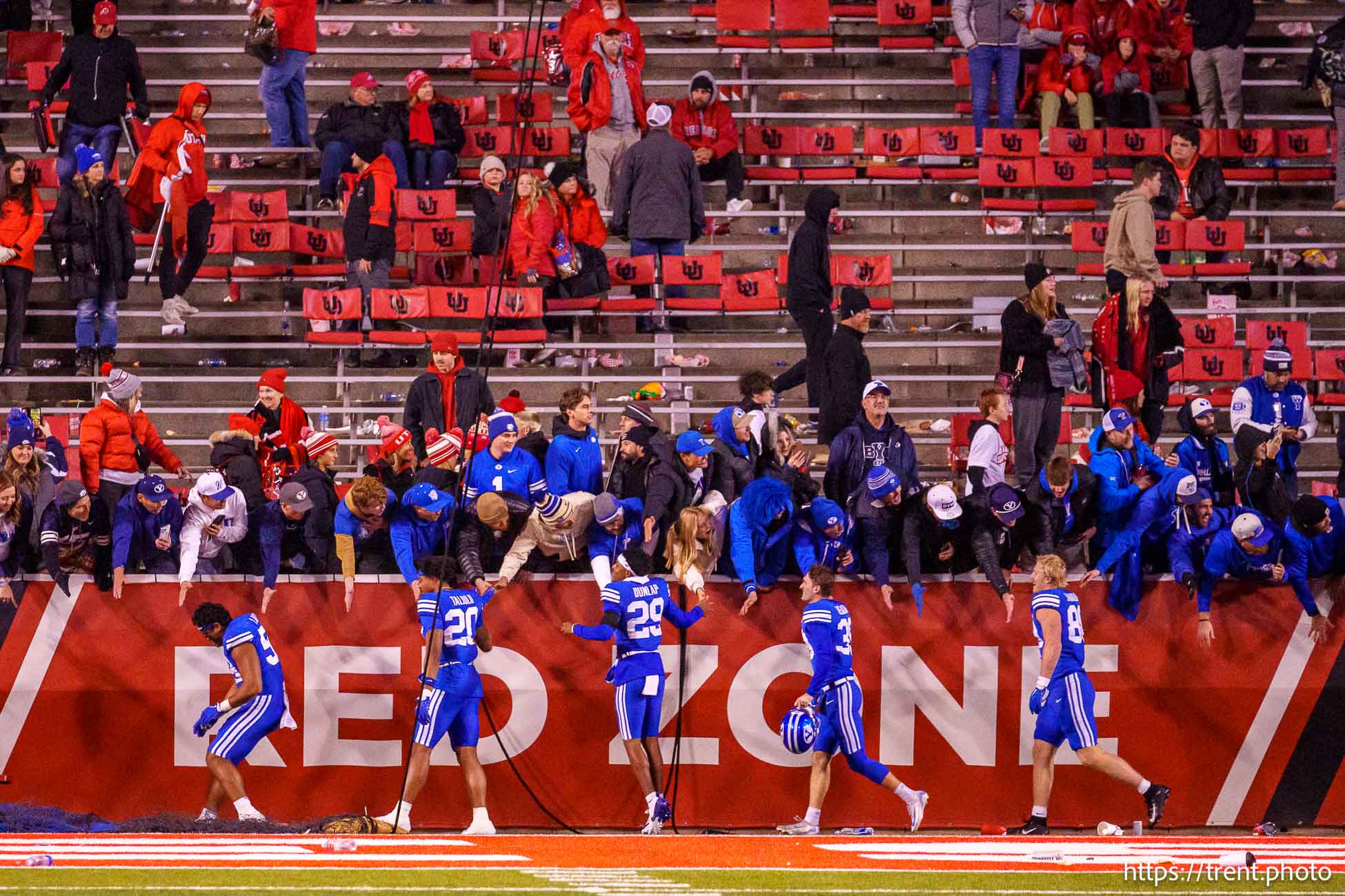 (Trent Nelson  |  The Salt Lake Tribune) 
BYU players celebrate with fans as Utah hosts BYU, NCAA football in Salt Lake City on Sunday, Nov. 10, 2024.