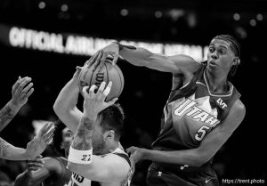 (Trent Nelson  |  The Salt Lake Tribune) Utah Jazz forward Cody Williams (5) defending Dallas Mavericks guard Luka Doncic (77) as the Utah Jazz host the Dallas Mavericks, NBA basketball in Salt Lake City on Thursday, Nov. 14, 2024.