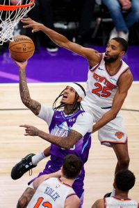 (Trent Nelson  |  The Salt Lake Tribune) New York Knicks forward Mikal Bridges (25) blocks Utah Jazz guard Jordan Clarkson (00) as the Utah Jazz host the New York Knicks, NBA basketball in Salt Lake City on Saturday, Nov. 23, 2024.