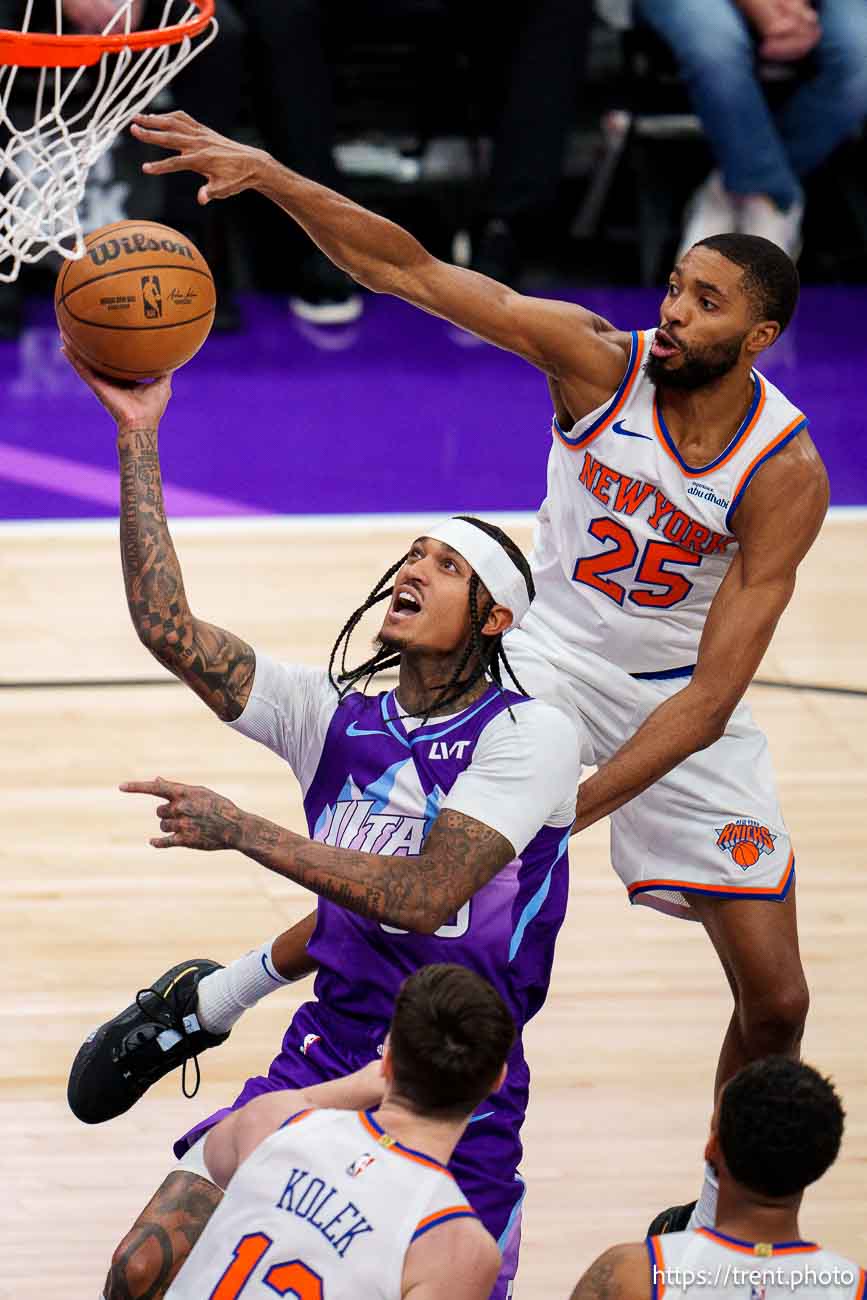 (Trent Nelson  |  The Salt Lake Tribune) New York Knicks forward Mikal Bridges (25) blocks Utah Jazz guard Jordan Clarkson (00) as the Utah Jazz host the New York Knicks, NBA basketball in Salt Lake City on Saturday, Nov. 23, 2024.