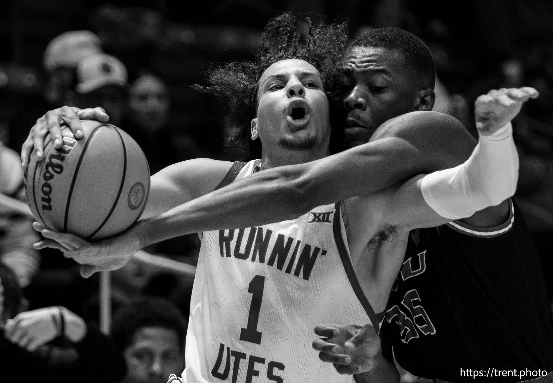 (Trent Nelson  |  The Salt Lake Tribune) Utah Utes guard Miro Little (1) defended by Eastern Washington Eagles forward Shaumba Ngoyi (35) as Utah hosts Eastern Washington, NCAA basketball in Salt Lake City on Saturday, Nov. 30, 2024.