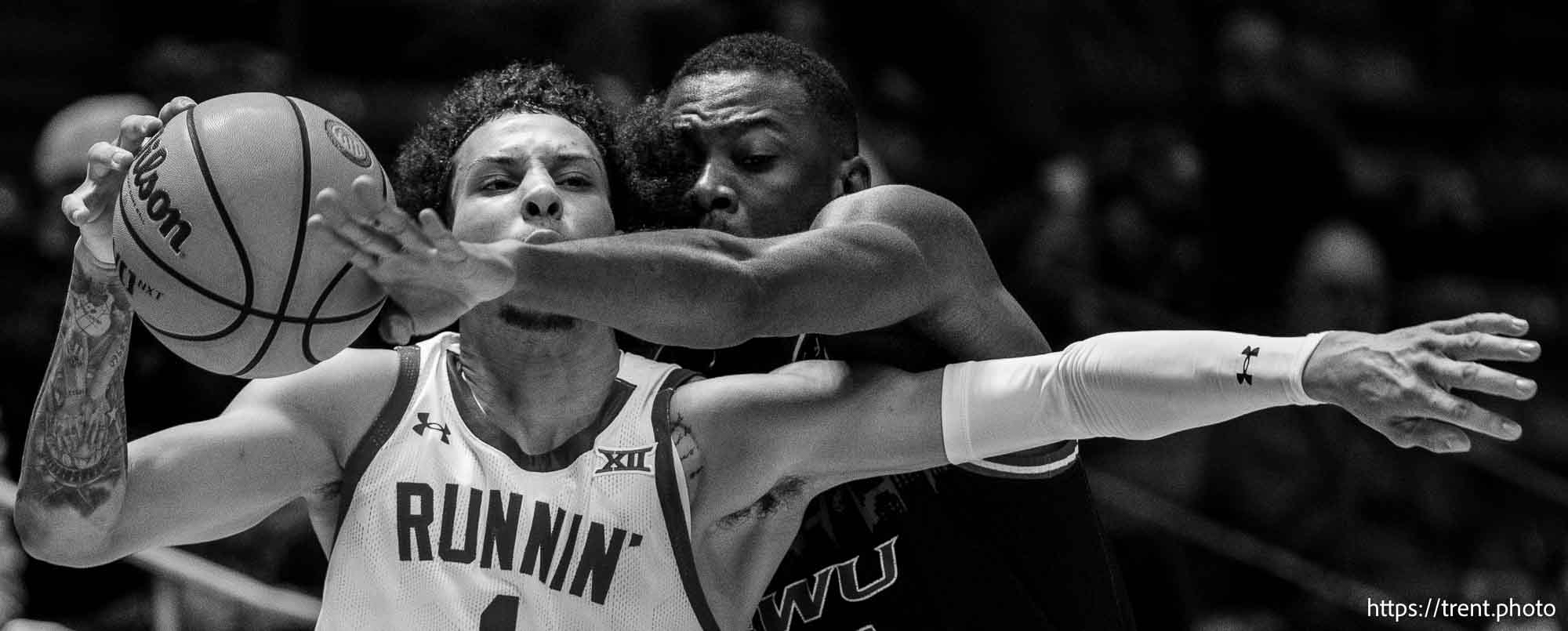 (Trent Nelson  |  The Salt Lake Tribune) Utah Utes guard Miro Little (1) defended by Eastern Washington Eagles forward Shaumba Ngoyi (35) as Utah hosts Eastern Washington, NCAA basketball in Salt Lake City on Saturday, Nov. 30, 2024.