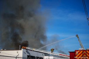 (Trent Nelson  |  The Salt Lake Tribune) A warehouse on fire at 1050 South 200 West in Salt Lake City on Thursday, Dec. 19, 2024.