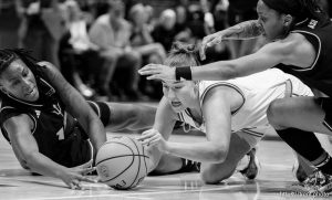 (Trent Nelson  |  The Salt Lake Tribune) 
Utah Utes guard Grace Foster (10) dives for a loose ball as Utah hosts Arizona State, NCAA basketball in Salt Lake City on Saturday, Dec. 21, 2024.