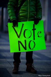 (Trent Nelson  |  The Salt Lake Tribune) People against the confirmation of Pete Hegseth as Secretary of Defense at a rally organized by Salt Lake Indivisible at the Wallace F. Bennett Federal Building in Salt Lake City on Wednesday, Jan. 22, 2025.