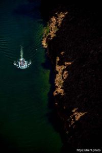 (Trent Nelson  |  The Salt Lake Tribune) Rafts on the Colorado River as seen from Navajo Bridge in Ariz. on Tuesday, May 20, 2025.