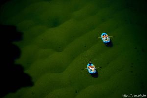 (Trent Nelson  |  The Salt Lake Tribune) Rafts on the Colorado River as seen from Navajo Bridge in Ariz. on Tuesday, May 20, 2025.