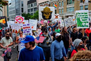 (Trent Nelson | The Salt Lake Tribune) 'No Kings' protest march heading north on State Street in Salt Lake City, Saturday, June 14, 2025.