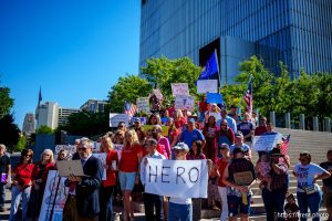 (Trent Nelson  |  The Salt Lake Tribune) People gather in support of Dr. Michael Kirk Moore Jr. in front of the Orrin G. Hatch U.S. Courthouse in Salt Lake City on Friday, July 11, 2025.