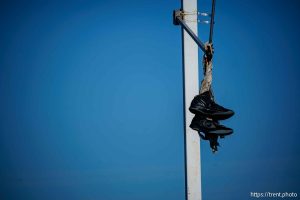 hanging shoes, Tuesday June 10, 2025.