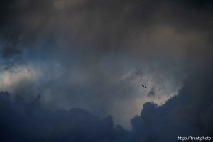 (Trent Nelson  |  The Salt Lake Tribune) clouds at sunset over the Bingham Copper Mine, and planes Draper on Wednesday, July 9, 2025.