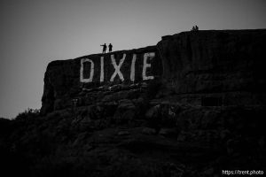 (Trent Nelson  |  The Salt Lake Tribune) People watch the sun set from Dixie Rock in St. George on Tuesday, Sept. 16, 2025.