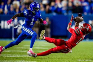 (Trent Nelson  |  The Salt Lake Tribune) 
Utah Utes wide receiver Larry Simmons (12) can't quite hold on as BYU hosts Utah, NCAA football at LaVell Edwards Stadium in Provo on Saturday, Oct. 18, 2025.