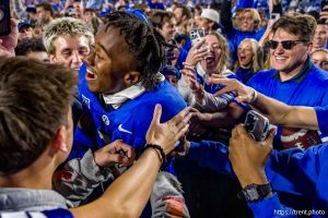 (Trent Nelson  |  The Salt Lake Tribune) BYU fans celebrate the win over Utah, NCAA football at LaVell Edwards Stadium in Provo on Saturday, Oct. 18, 2025.