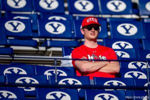 (Trent Nelson  |  The Salt Lake Tribune) A Utah fan awaits kickoff as BYU hosts Utah, NCAA football at LaVell Edwards Stadium in Provo on Saturday, Oct. 18, 2025.