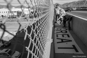 (Trent Nelson  |  The Salt Lake Tribune) An overpass protest in West Valley City on Friday, Oct. 31, 2025.