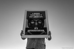 (Trent Nelson  |  The Salt Lake Tribune) Overpass protest in West Valley City on Friday, Oct. 31, 2025.