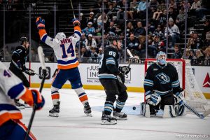 (Trent Nelson  |  The Salt Lake Tribune) New York Islanders center Bo Horvat (14) scores the game-winning goal in overtime as the Utah Mammoth host the New York Islanders, NHL hockey in Salt Lake City on Friday, Nov. 14, 2025. At right is Utah Mammoth goaltender Karel Vejmelka (70).