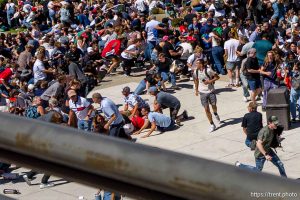 (Trent Nelson  |  The Salt Lake Tribune) People react after Charlie Kirk is shot during an appearance at Utah Valley University in Orem on Wednesday, Sept. 10, 2025.