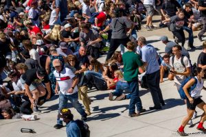 (Trent Nelson  |  The Salt Lake Tribune) People react after Charlie Kirk is shot during an appearance at Utah Valley University in Orem on Wednesday, Sept. 10, 2025.