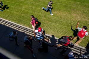(Trent Nelson  |  The Salt Lake Tribune) People react after Charlie Kirk is shot during an appearance at Utah Valley University in Orem on Wednesday, Sept. 10, 2025.