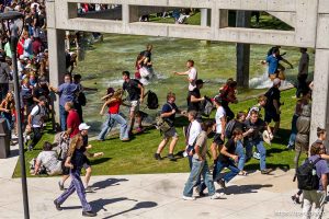 (Trent Nelson  |  The Salt Lake Tribune) People react after Charlie Kirk is shot during an appearance at Utah Valley University in Orem on Wednesday, Sept. 10, 2025.