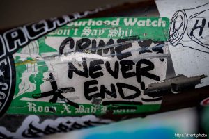 neighborhood watch, don't say shit, crime never ends sticker in Salt Lake City on Friday, Dec. 5, 2025.