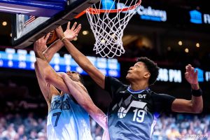 (Trent Nelson  |  The Salt Lake Tribune) Utah Jazz forward Kevin Love (42) defending Memphis Grizzlies forward Santi Aldama (7) as the Utah Jazz host the Memphis Grizzlies, NBA basketball in Salt Lake City on Tuesday, Dec. 23, 2025.