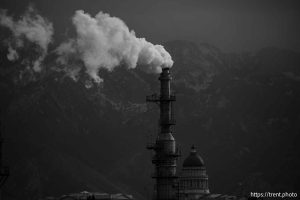 (Trent Nelson  |  The Salt Lake Tribune) Emissions from a refinery and the Utah Capitol in Salt Lake City on Friday, Dec. 26, 2025.