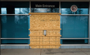 boarded up doorways in Salt Lake City on Friday, Dec. 26, 2025.